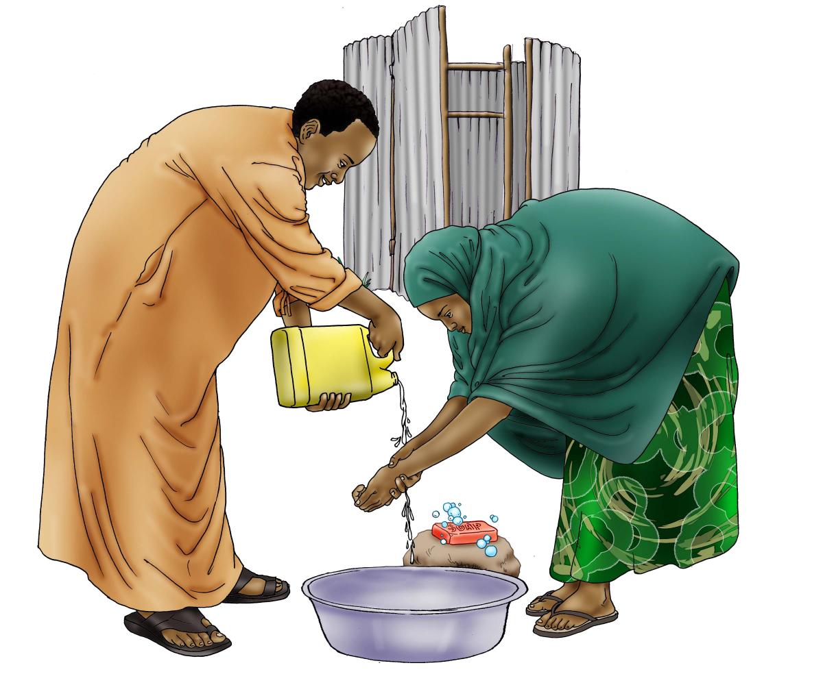 Sanitation - Woman and man washing hands - 07 - Kenya Dadaab