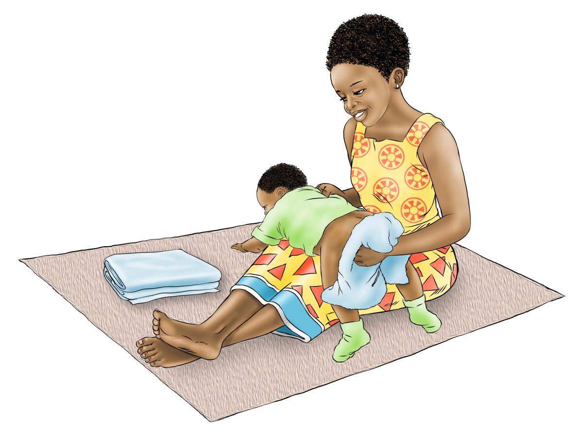 Family - Sibling washing baby's bottom - 03 - Nigeria