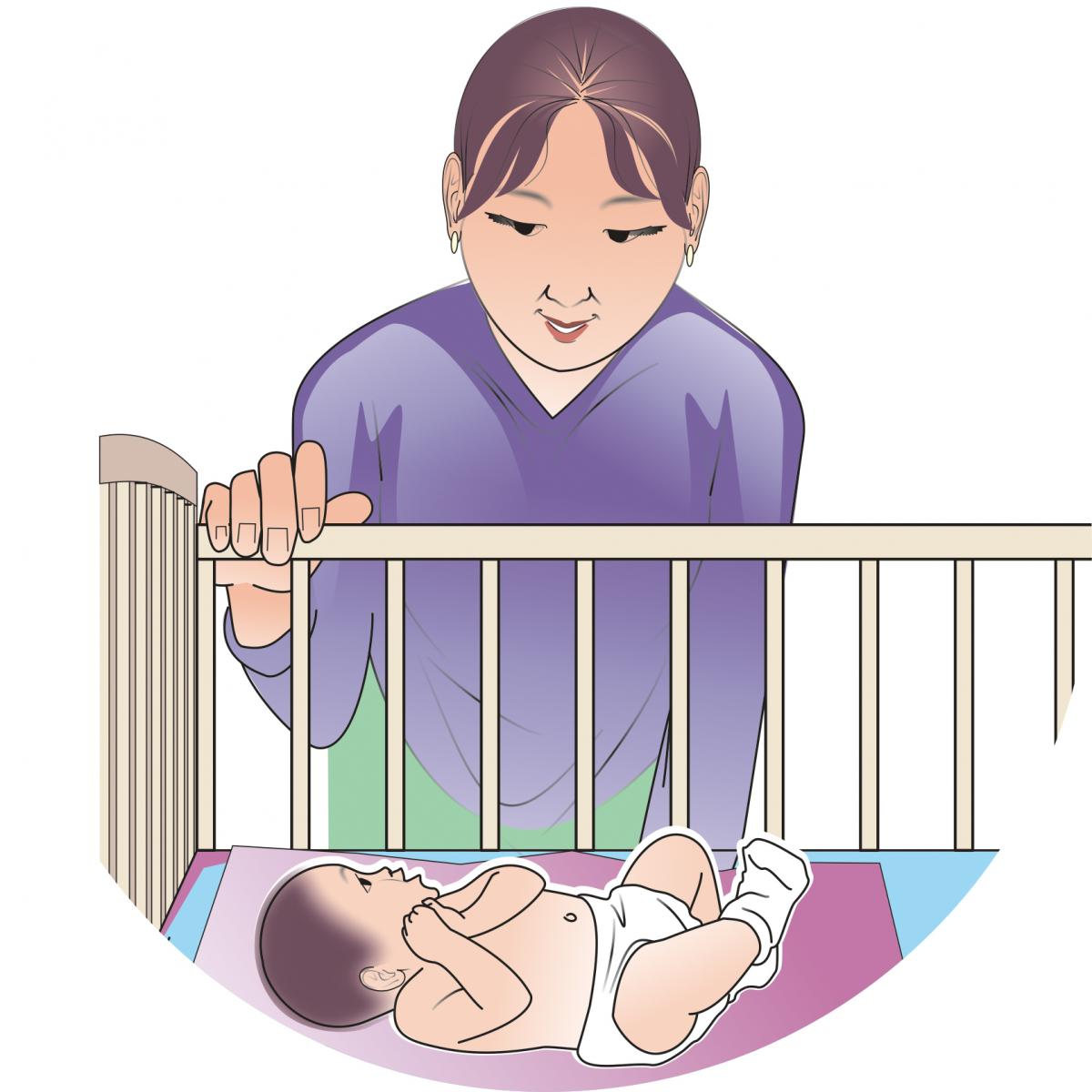 Family - Mother watching baby in crib - - Kyrgyz Republic Family - Mother watching baby in crib - - Kyrgyz Republic