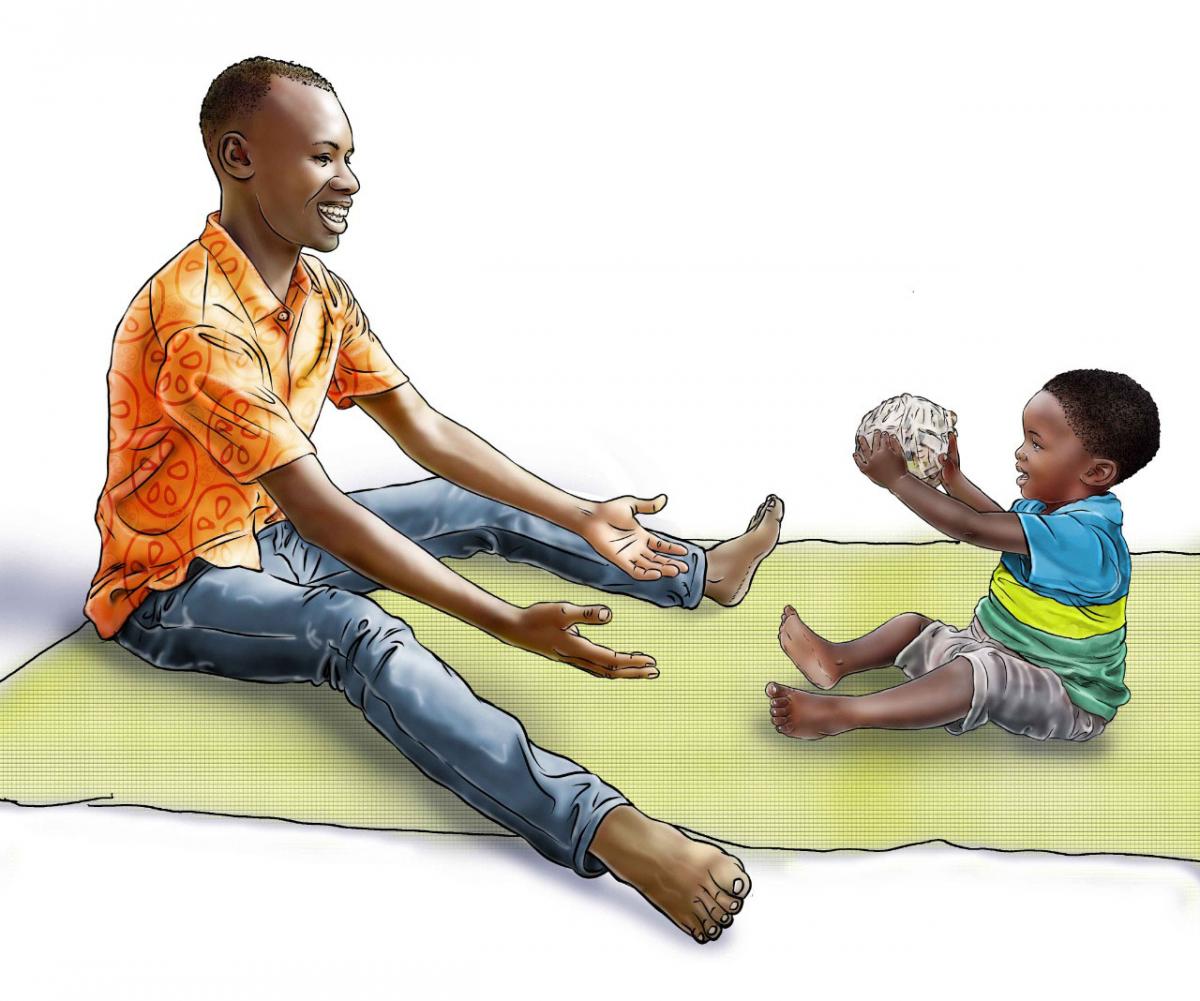 Learning through Play - Father playing ball with boy child - 02C - Rwanda